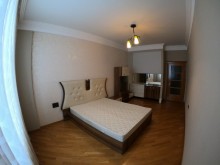 Satılır Yeni Tikili, Binəqədi.r, 9-cu mikrorayon, Memar Əcəmi.m-18