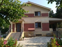 Novxanı qəsəbəsi elit məhəllədə  14 sot ərazidə təmir villa satılır., -1