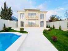 Merdekan qesebesinde Bravo market ətrafında 7 sot torpaq sahesinde insa edilmiş 2 mertebeli villa, -1