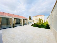Merdekan qesebesinde Bravo market ətrafında 7 sot torpaq sahesinde insa edilmiş 2 mertebeli villa, -4