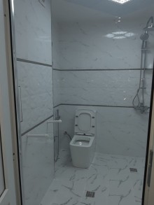 Heydər Əliyev prospektində 6 mərtəbəli yeni tikili evde 3 otaq menzil, -15