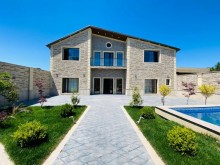 Merdekan Suvelan arasinda merkezi yerde bag evi, -2