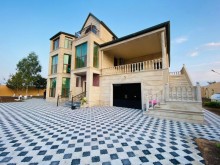 Gülçülük savxozunda 26 sot torpaq sahesinde insa edilmis 2 mertebe + mansarli villa, -2