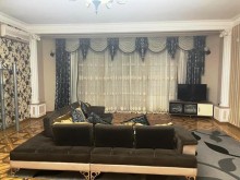 Nizami metrosunun yanında 12/5 mərtəbəli yeni tikili binada 4 otaqli ev, -1