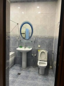 Nizami metrosunun yanında 12/5 mərtəbəli yeni tikili binada 4 otaqli ev, -10