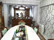 Merkezde Hökümət  evinin  arxasında menzil satilir, -12