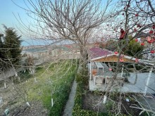 novxani aquapark, novxani hotel ve novxani cimerliyine 10 deqiqe yolu olan bag evi satilir, -19