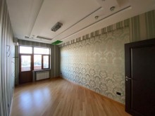 nerimanovda Heyder Aliyev merkezi terefde 4 otaqli menzil satilir, -11