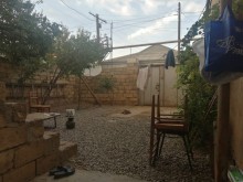 xirdalanda 1 mertebeli ev satilir, -2