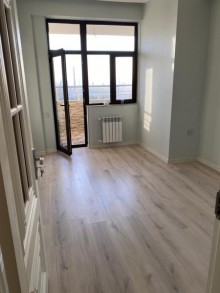 neftciler metrosuna yaxin 1 otaqdan 2 otaga duzelme yeni binada menzil satilir, -3