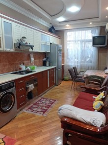 azadliqda 4 otaqli yeni binada menzil satilir, -3