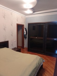 azadliqda 4 otaqli yeni binada menzil satilir, -7