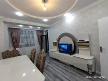 Xirdalanda 7 mərtəbəli, qazlı, liftli və çıxarışlı binanada 3 otaqli menzil, -1