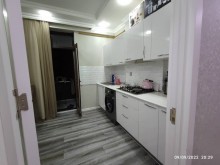 Xirdalanda 7 mərtəbəli, qazlı, liftli və çıxarışlı binanada 3 otaqli menzil, -9