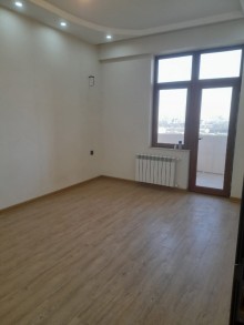Azadliq metrosuna yaxin Yeni tikili 18 mərtəbəli binada 3 otaqli menzil almaq, -9