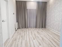 serq bazarinda 2 otaqli menzil satilir, -1