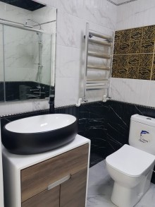 serq bazarinda 2 otaqli menzil satilir, -3
