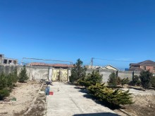 Şüvalanda dəniz yolunda 10 sot torpaq sahesi icinde natamam tikilisi var, -4