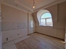 Xırdalanda mərkəzdə heydər parkının qarşısı qazlı liftli binada 2 otaqli menzil, -2