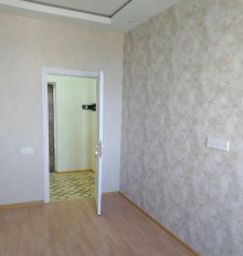 zabratda  2 otaqlı təmirli mənzil almaq, -1