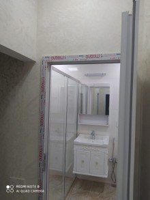 zabratda  2 otaqlı təmirli mənzil almaq, -12