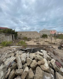 suvalanda torpaqlarin satisi kapital bank terefde, -2