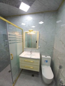 həzi aslanov metro stansiyasında yeni binada evler, -15