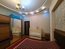 Həzi Aslanov metrosuna yaxın 97 kv/m 2 otaqlı mənzil satılı, -13