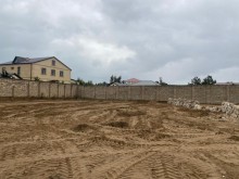 Mərdəkan qəsəbəsində Yeni Qoşa Qala restoranı yaxınlığında Buzovna yolunun üstündə 12 sot torpaq.., -1