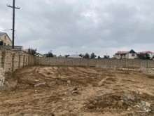 Mərdəkan qəsəbəsində Yeni Qoşa Qala restoranı yaxınlığında Buzovna yolunun üstündə 12 sot torpaq.., -3
