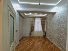 Mənzil almaq Xırdalan şəhəri H.Əliyev prospektində. Yeni tikili binada 3 otaqlı, -2