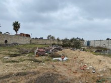 Suvelan deniz yolunda torpaq satisi, -5