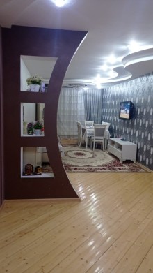 Bakıxanov qəsəbəsi mərkəzi yolun üstü Ülvü şadlıq evin yanı yeni tikili, -2