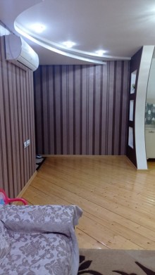 Bakıxanov qəsəbəsi mərkəzi yolun üstü Ülvü şadlıq evin yanı yeni tikili, -3