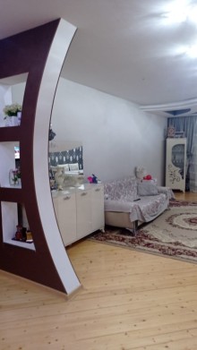 Bakıxanov qəsəbəsi mərkəzi yolun üstü Ülvü şadlıq evin yanı yeni tikili, -4
