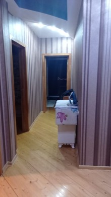 Bakıxanov qəsəbəsi mərkəzi yolun üstü Ülvü şadlıq evin yanı yeni tikili, -10