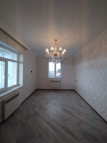 Bakixanovda İcra hakimiyyətinin yaxınlığı köhnə tikili binada 2 otaqlı mənzil, -3