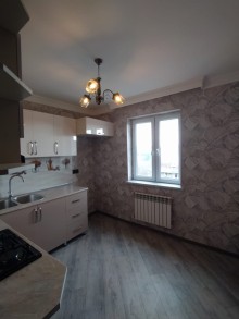 Bakixanovda İcra hakimiyyətinin yaxınlığı köhnə tikili binada 2 otaqlı mənzil, -6