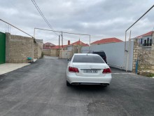 Merdekanda "Encirlik"market terefde torpaq almaq, -1