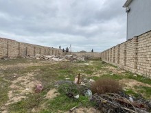 Merdekanda "Encirlik"market terefde torpaq almaq, -2