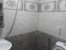 Xirdalanda Yeni Tikili heyet evinin 1 ci mertebesinde ev satilir, -10
