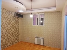 Əhmədli metrosu yaninda yeni tikili binada menzil satilir, -10