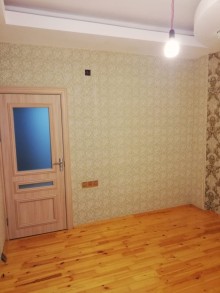 Əhmədli metrosu yaninda yeni tikili binada menzil satilir, -14