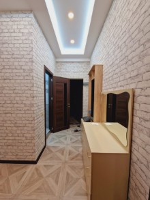 xirdalanda H.Eliyev parkinin qarshisinda Yeni Tikili, -1