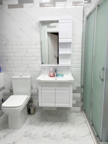 Bakıxanov qəsəbəsi mərkəzi yolun üstü Yeni Tikili, -6