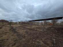 Qalada magistral yoldan 1 km aralıda 12 sot torpaq satılır, -3